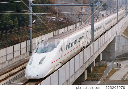 Kyushu Shinkansen 800 series speeding between Chikugo Funagoya and Shin-Omuta 123203978