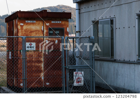 Abandoned, rusty old electrical substation equipment 123204798