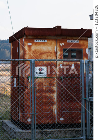 Abandoned, rusty old electrical substation equipment Abandoned, rusty old electrical substation equipment 123204826
