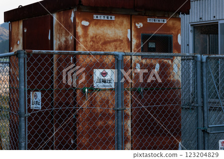 Abandoned, rusty old electrical substation equipment 123204829