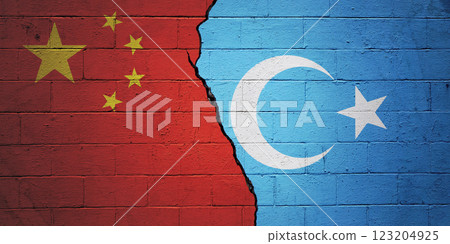 China vs Uyghur - Cracked cinder block wall 123204925