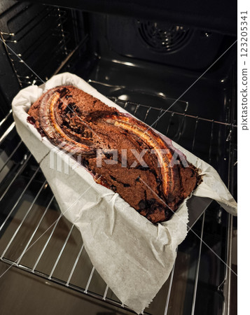 Delicious homemade blueberry banana bread cooling down in a domestic oven in prague, czechia, after baking for Mother's Day Valentines 123205341