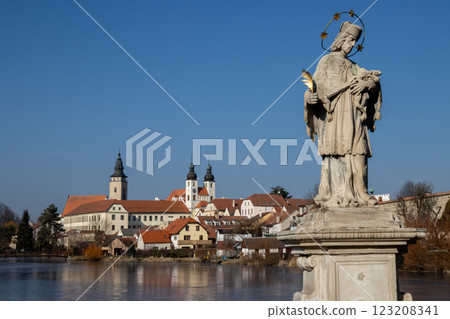 Statue and a citysccape, Telc, Czech republic Statue and a citysccape, Telc, Czech republic 123208341
