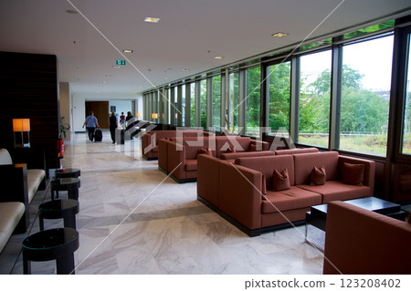 Mainz, Germany, July 8, 2017: Luxury Hotel Lobby with Elegant Seating and Marble Floor Mainz, Germany, July 8, 2017: Luxury Hotel Lobby with Elegant Seating and Marble Floor 123208402