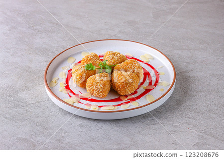 Camembert fries cheese in panko breading and cranberry sauce. Fast food menu Camembert fries cheese in panko breading and cranberry sauce. Fast food menu 123208676