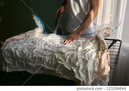 Vacuum Sealing Clothes Effectively for Storage, Preservation, and Space Saving Solutions Vacuum Sealing Clothes Effectively for Storage, Preservation, and Space Saving Solutions 123209849
