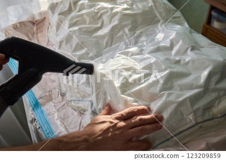 Vacuum Sealing Clothes Effectively for Storage, Preservation, and Space Saving Solutions 123209859