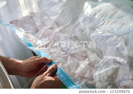Vacuum Sealing Clothes Effectively for Storage, Preservation, and Space Saving Solutions 123209870