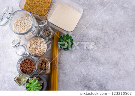 Zero waste storage concept with groats in jars Zero waste storage concept with groats in jars 123210502
