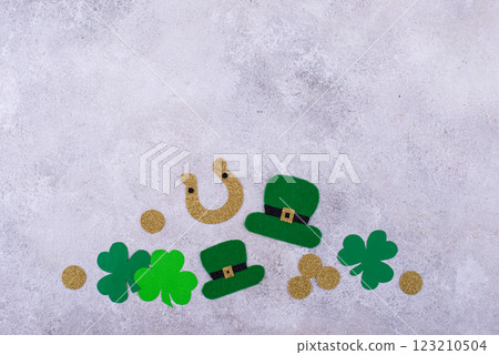 St. Patrick's Day concept with leprechaun hat, gold coins and horseshoe 123210504