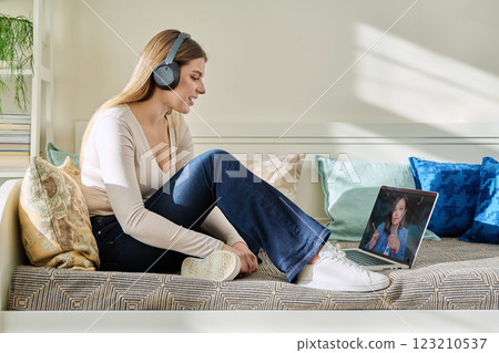 Young woman studying online, student having video call with teacher Young woman studying online, student having video call with teacher 123210537