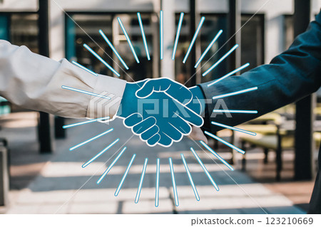 Graphic handshake - futuristic business scene 123210669