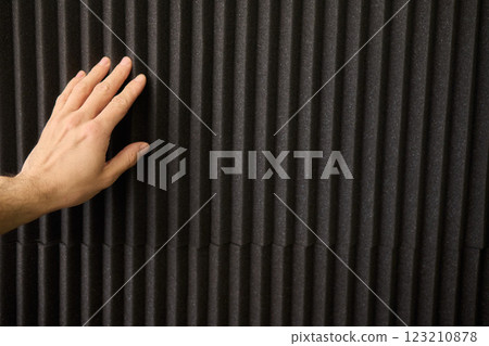 Applying Acoustic Panels for Effective Soundproofing and Enhanced Room Acoustics 123210878