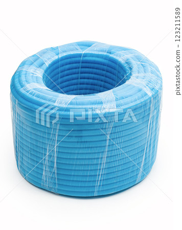 Plastic corrugated pipe isolated on a white background. Packaging stretch film. Plastic corrugated pipe isolated on a white background. Packaging stretch film. 123211589