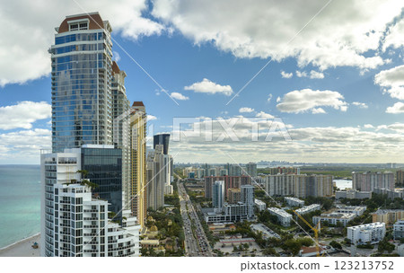Expensive highrise hotels and condos on Atlantic ocean shore in Sunny Isles Beach city. American tourism infrastructure in southern Florida 123213752