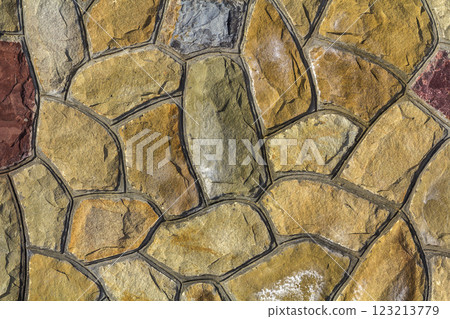 Different sizes of sand stones. Stone wall pattern background Different sizes of sand stones. Stone wall pattern background 123213779