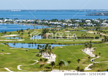 Big golf course field with green grass in Boca Grande, small town on Gasparilla Island in southwest Florida Big golf course field with green grass in Boca Grande, small town on Gasparilla Island in southwest Florida 123214160
