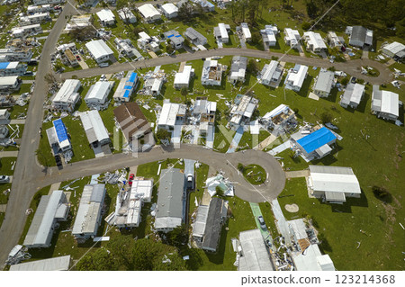 Badly damaged mobile homes after hurricane Ian in Florida residential area. Consequences of natural disaster Badly damaged mobile homes after hurricane Ian in Florida residential area. Consequences of natural disaster 123214368