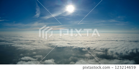 Aerial view from high altitude of earth covered with puffy rainy clouds forming before rainstorm Aerial view from high altitude of earth covered with puffy rainy clouds forming before rainstorm 123214659
