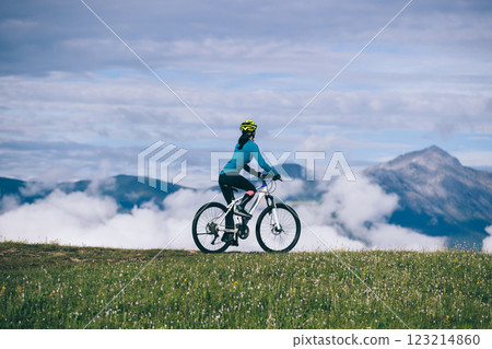 Riding mountain bike on beautiful mountain top 123214860