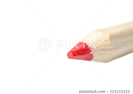 Red colored pencil tip on a white background 123215222