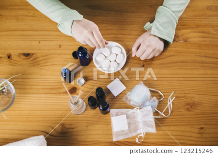 Woman's hands relaxing with aromatherapy Woman's hands relaxing with aromatherapy 123215246