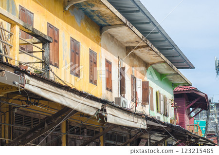 Abandoned buildings with colorful facades and shutters 123215485