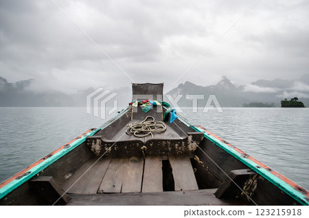 Boat view on calm water with cloudy sky at Khao Sok national park at Surat Thani, Thailand 123215918