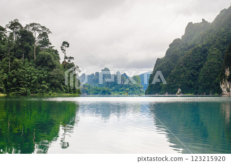 Khao Sok national park at Surat Thani, Thailand, Serene lake surrounded by lush mountains Khao Sok national park at Surat Thani, Thailand, Serene lake surrounded by lush mountains 123215920