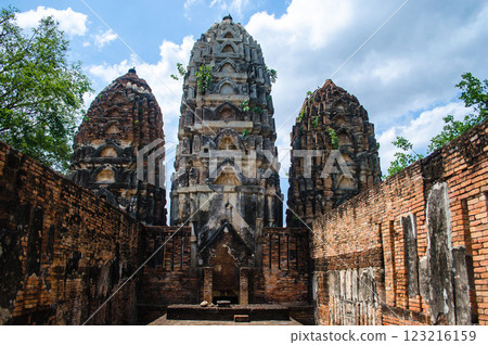 Ancient temple ruins under a cloudy sky at Sukhothai Thailand Ancient temple ruins under a cloudy sky at Sukhothai Thailand 123216159