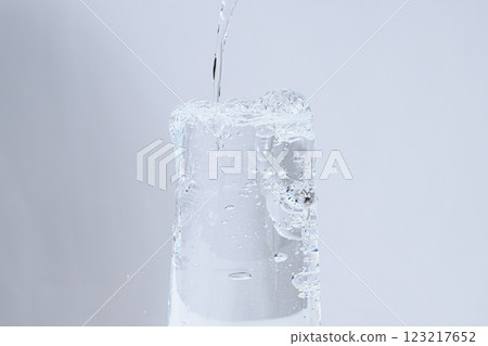 Water poured into the glass 123217652
