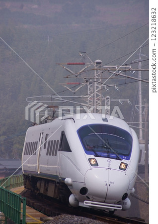 JR Kyushu 885 series Kamome train running through Tara Town, Saga Prefecture JR Kyushu 885 series Kamome train running through Tara Town, Saga Prefecture 123218632