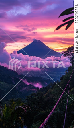 Majestic Volcano at Dawn with Ethereal Clouds and Mountain Landscape for Artistic Prints 123219388
