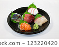Sashimi platter at a bar 123220420
