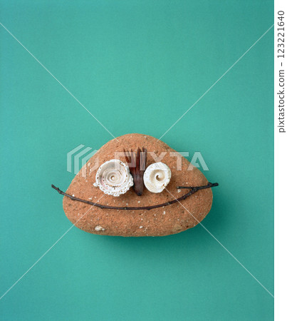 Expressive stone characters drawn with natural materials 123221640