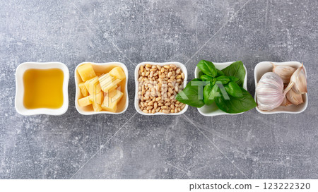 Traditional Italian pesto recipe on a grey stone background. 123222320