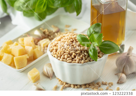 Ingredients for making Pesto sauce on a white wooden table. Ingredients for making Pesto sauce on a white wooden table. 123222338