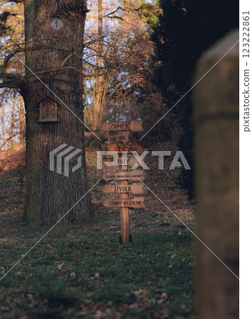 A signboard in a forest with autumn leaves in Europe A signboard in a forest with autumn leaves in Europe 123222861