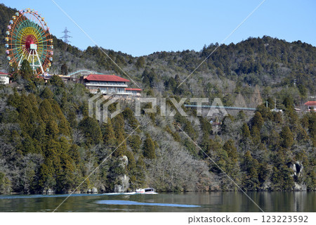 Forest and red ferris wheel 123223592