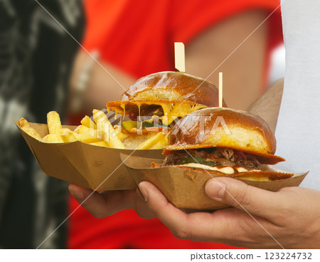 Two Delicious Burgers Served With French Fries in Takeaway Containers 123224732