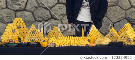 Stand with a wide range of beeswax candles Stand with a wide range of beeswax candles 123224993