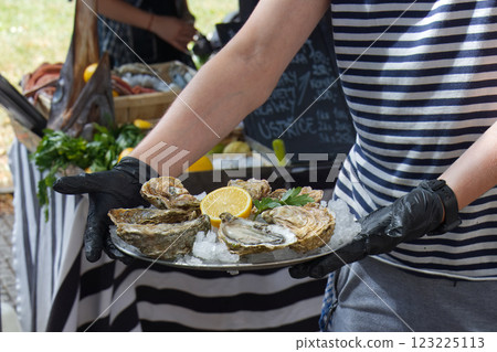 Demonstration cooking, chef showing his offer for visitors of food market. 123225113