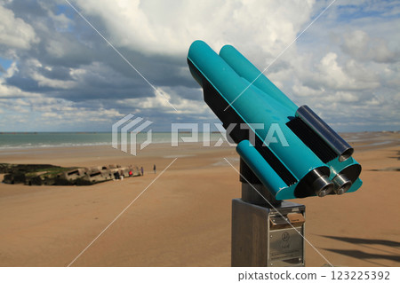 Coin-Operated Binoculars at Mulberry beach in Arromanches Coin-Operated Binoculars at Mulberry beach in Arromanches 123225392