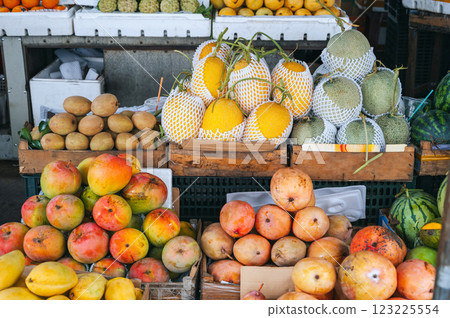 assortment of tropical exotic fruits at Asian food market in Asia in Vietnam. Mango and Vietnamese ripe sweet fruits 123225554