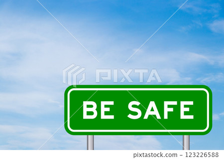 Green color transportation sign with word be safe on blue sky with white cloud background Green color transportation sign with word be safe on blue sky with white cloud background 123226588