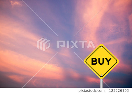 Yellow transportation sign with word buy on violet color sky background 123226593