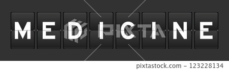 Black color analog flip board with word medicine on gray background Black color analog flip board with word medicine on gray background 123228134