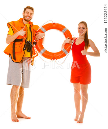 Lifeguards in life vest with ring buoy. Success. 123228434