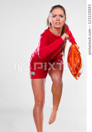 lifeguard running with equipment 123228883