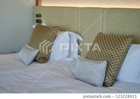 Beautiful hotel bed making Beautiful hotel bed making 123228913